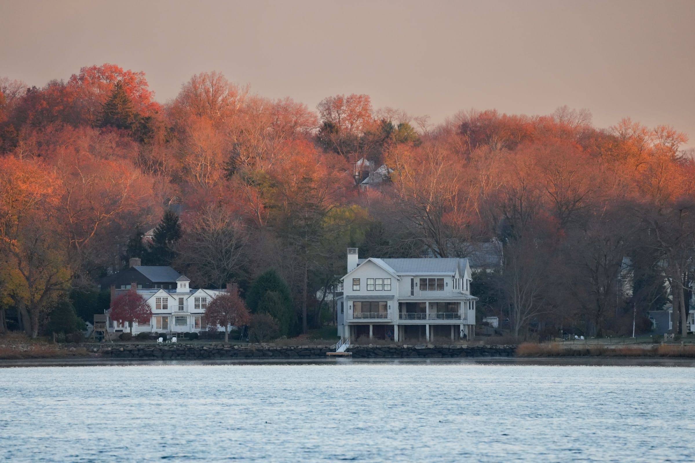 Norwalk, CT: shoreline homes among autumn foliage on Long Island Sound