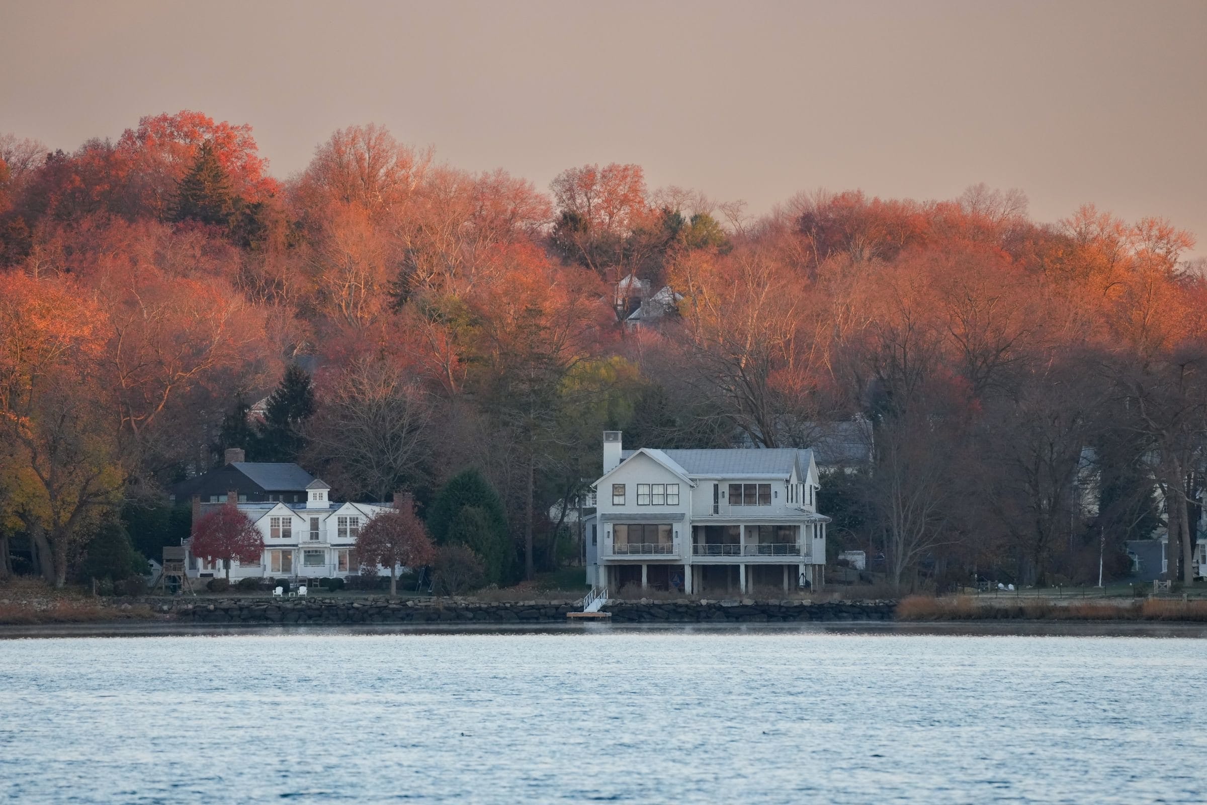 Norwalk, CT: shoreline homes among autumn foliage on Long Island Sound